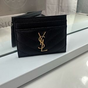 Brand new YSL card holder in black with gold hardware